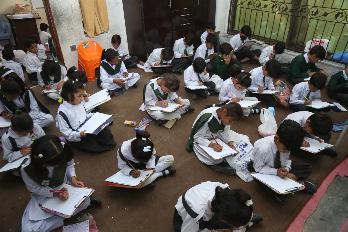 A classroom of Maranatha pupils writing