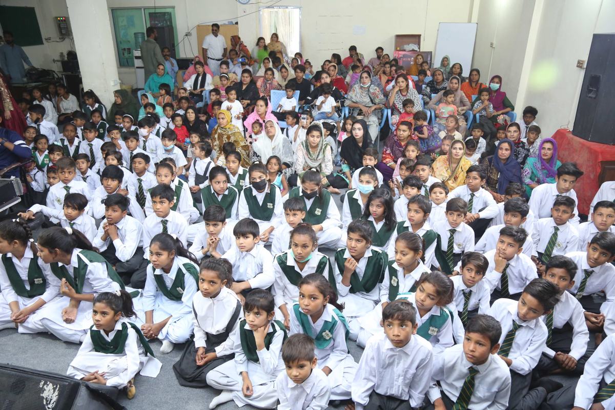 Pupils and families at the annual programme