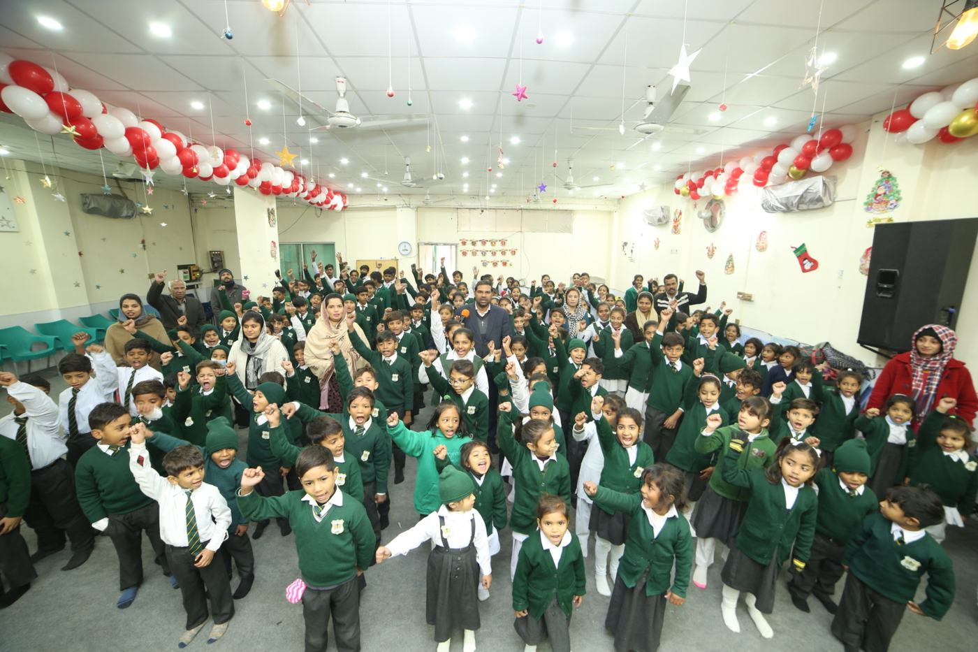 Pupils of the first Maranatha school in their school hall in Lahore